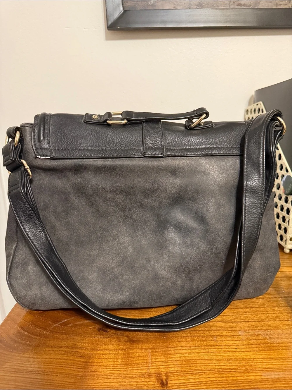 Black Women's Leather Messenger Bag with Gold Hardware
